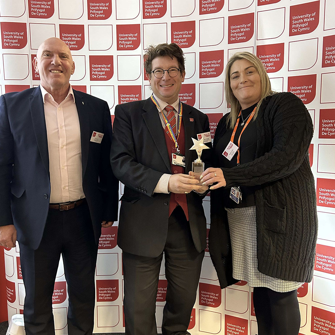 OCS, the winners of the innovation-award-winner–ocs receiving their award from Professor Martin Stegall